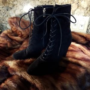 A Black Pair of Lace Up/Zip Boots